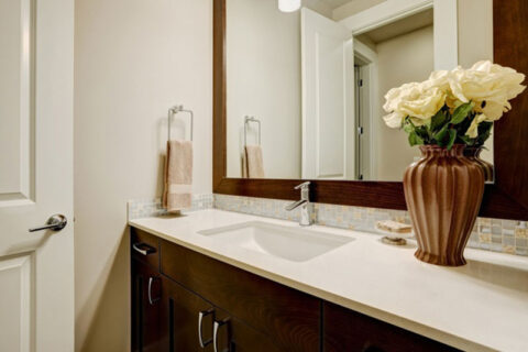 A bathroom cabinet with flower