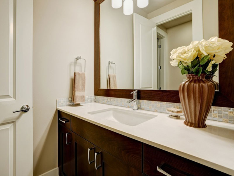 A bathroom cabinet with flower