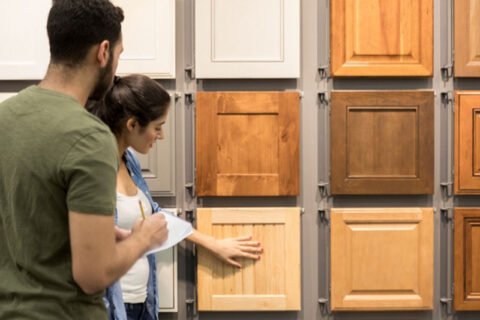 A Women Choosing a Cabinet
