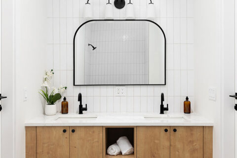vanity and mirror in newly upgraded bathroom